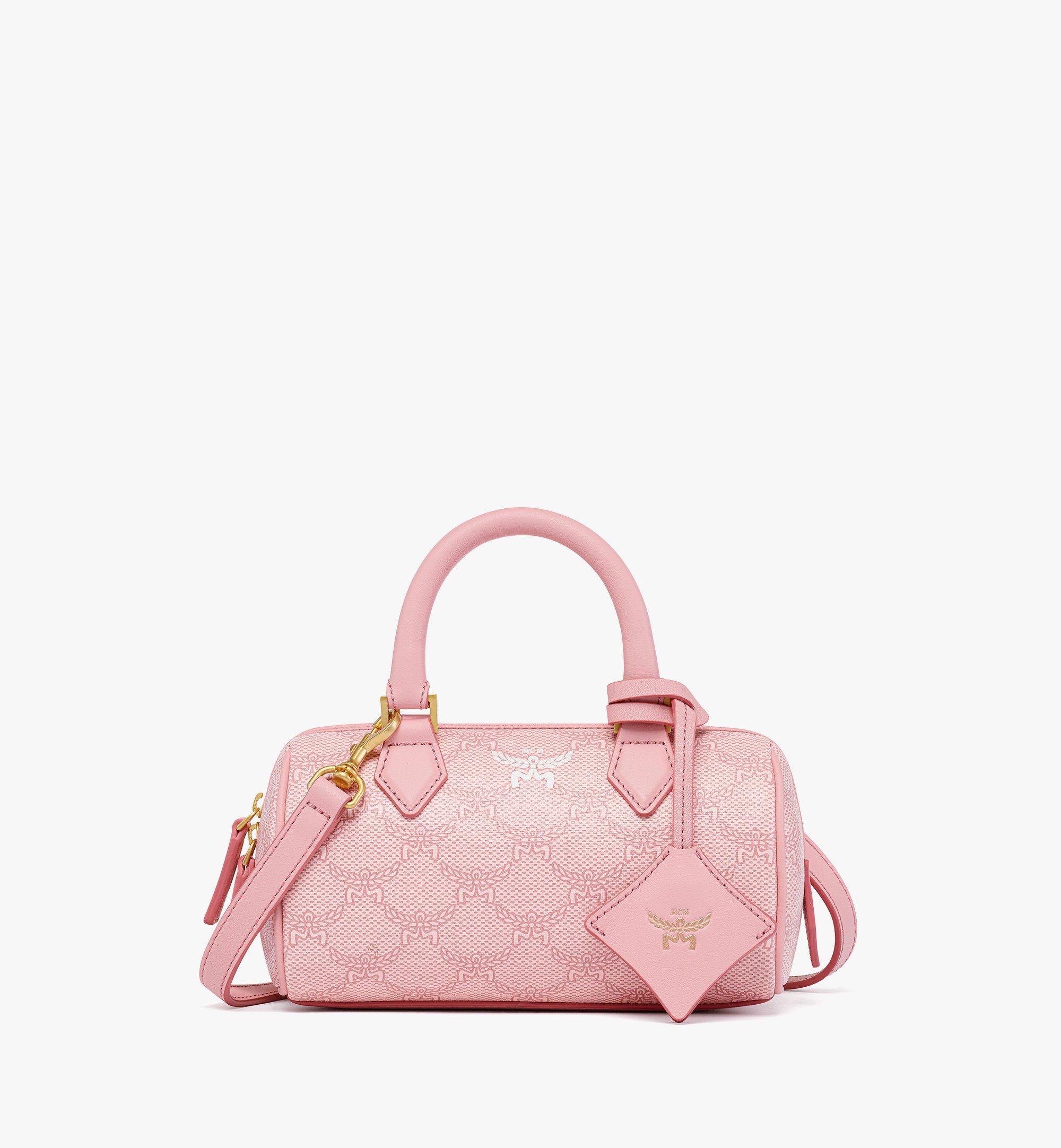 Pink discount mcm luggage